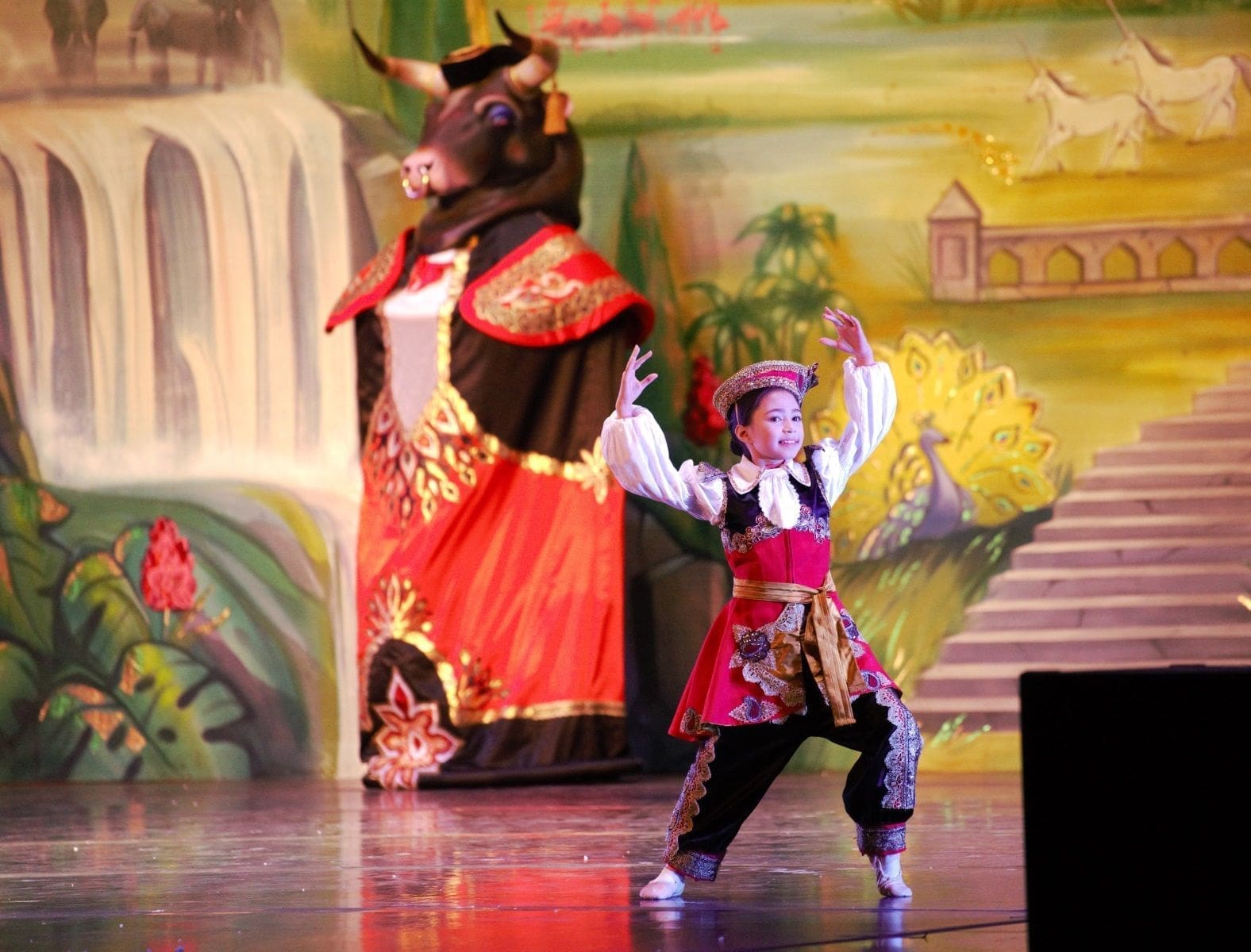 a-dance-with-us-student-and-the-lifesize-bull-puppet-in-the-spanish-variation.original